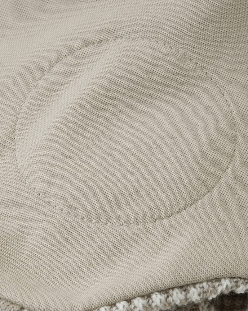 Ullue med ører og øreklaffer med vindstoppere | Kuuru