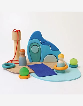 Small world play by the water